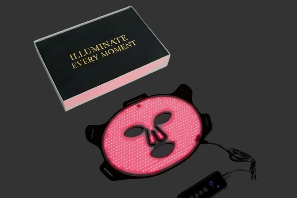 AURELIA ÆTHER Red Light Therapy Face Mask with handheld controller on a clean grey background.